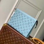 {Style No: SM5XN2LK} POCHETTE VOYAGE 26 IN SKY BLUE MONOGRAM ECLIPSE CALFSKIN