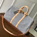 {Style No: P2FHE3YR} KEEPALL BANDOULIÈRE 45 IN GREY MONOGRAM DENIM LIGHT BROWN CALFSKIN