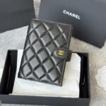 {Style No: QULV7J93} CHANEL 25S MULTI PURPOSE PASSPORT WALLET 15 IN BLACK LAMBSKIN GOLD HARDWARE
