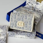 {Style No: EKIA1GGS} DIOR 25S CARO CARD HOLDER 11 IN LIGHT BLUE CALFSKIN AND CANVAS GOLD HARDWARE