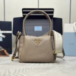{Style No: FG5AG4A9} PRADA 25S SMALL BAG 23 IN TAUPE CALFSKIN GOLD HARDWRE