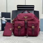 {Style No: KV9WN4HK} PRADA 25S RE-EDITION 1978 SMALL BACKPACK 32 IN BURGUNDY RE-NYLON
