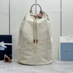 {Style No: 7XUTUX7L} PRADA 25S DRAWSTRING BACKPACK 55 IN BEIGE CANVAS LINEN SILVER HARDWARE