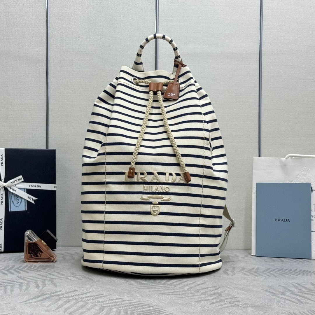 {Style No: 8PGOHVDT} PRADA 25S DRAWSTRING BACKPACK 55 IN HORIZONTAL STRIPES CANVAS SILVER HARDWRE