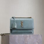 {Style No: 5XLJGIPU} YSL 25S SUNSET MEDIUM 22 IN LIGHT BLUE CROCODILE-EMBOSSED CALFSKIN GOLD HARDWARE