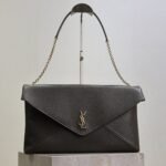{Style No: PHG9DZK4} YSL 25S CASSANDRE ENVELOPE MESSENGER 35 IN LIGHT MUSK LAMBSKIN GOLD HARDWRE