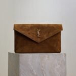 {Style No: 5F75N4JG} YSL 25S CASSANDRE LARGE ENVELOPE POUCH 29 IN BURNT UMBER SUEDE GOLD HARDWARE
