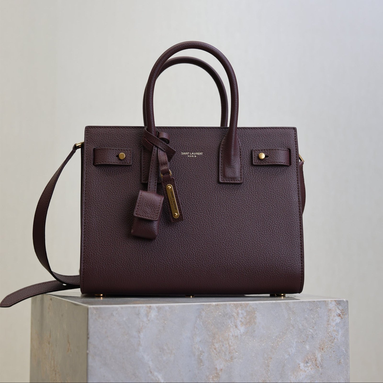 {Style No: SWGU45TW} YSL 25S SAC DE JOUR MM 26 IN ROUGE CABERNET SUPPLE GRAINED CALFSKIN