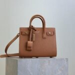 {Style No: 5J49HE44} YSL 25S SAC DE JOUR 22 IN CHESTNUT BROWN SUPPLE GRAINED CALFSKIN