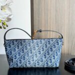 {Style No: IS6ZHTE1} TRAVEL NOMAD POUCH 22 IN BLUE MONOGRAM OBLIQUE JACQUARD