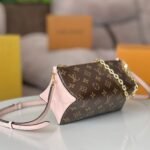 {Style No: IS5V86FP} BLOOM POUCH 22 IN BROWN MONOGRAM CANVAS AND PASTEL PINK CALFSKIN SIDES