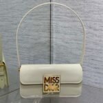 {Style No: OIU1JNWX} FLAP BAG 18 IN WHITE PATENT CALFSKIN