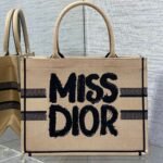 {Style No: LMN9CJK5} BOOK TOTE 36 BEIGE AND BLACK MISS DIOR GRAFFITI EMBROIDERY