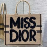 {Style No: 27UGLSNZ} LARGE BOOK TOTE 42 BEIGE AND BLACK MISS DIOR GRAFFITI EMBROIDERY