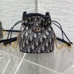 {Style No: K4K2ULFQ} MONTAIGNE MINI 18 BUCKET BAG WITH DRAWSTRING IN BLUE OBLIQUE JACQUARD