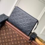 {Style No: DY87ETVJ} POCHETTE VOYAGE 22 IN BLACK MONOGRAM SHADOW CALFSKIN