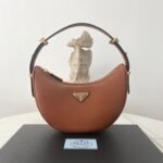 {Style No: LER3OJ6T} PRA ARQUÉ 22 SHOULDER BAG IN COGNAC BROWN LEATHER