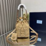 {Style No: GHS1LQOL} BUCKET BAG 20 IN BEIGE WOVEN RAFFIA EMBOSSED LOGO