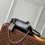 {Style No: MLZUOOJU} POCHETTE VIBE HANDBAG 25 IN BLACK LAMBSKIN BROWN COWHIDE AND COATED CANVAS TRIM