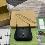 {Style No: OCMHNH8M} JACKIE NOTTE MINI BAG 19 IN BLACK CALFSKIN GOLD HARDWARE