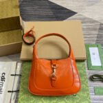 {Style No: NRKWMPDS} JACKIE SMALL SHOULDER BAG 27 IN ORANGE CRACKED LACQUER CALFSKIN GOLD HARDWARE
