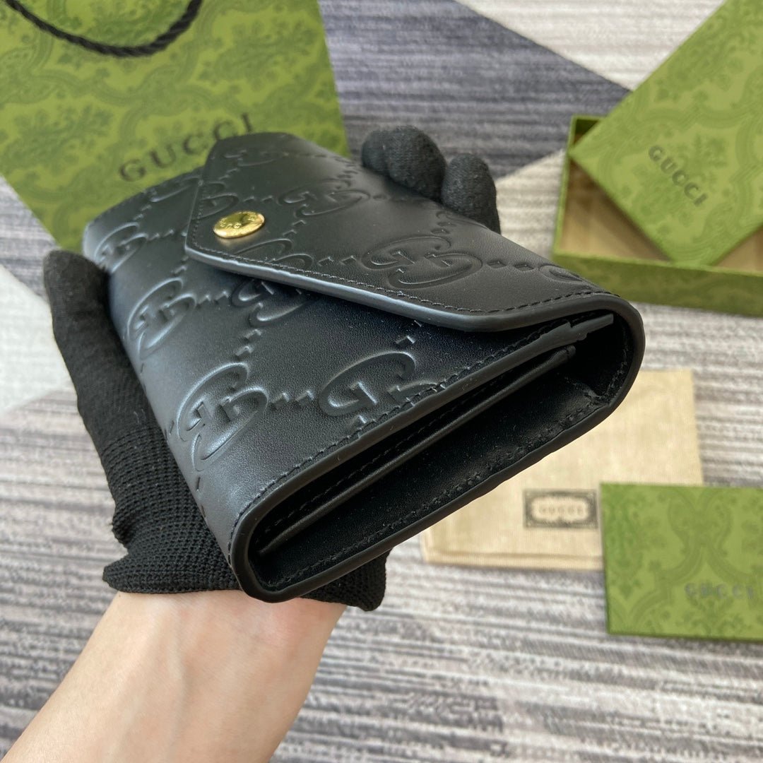 {Style No: N2L7UIEN} CONTINENTAL WALLET 19 IN BLACK EMBOSSED CALFSKIN GOLD HARDWARE - Image 3