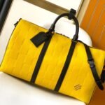 {Style No: UJGWTBQV} KEEPALL BANDOULIÈRE 50 IN YELLOW DAMIER SCUBA CALFSKIN