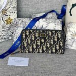 {Style No: YRLQXXBB} MONTAIGNE VOYAGEUR LONG WALLET 20 IN BLACK MONOGRAM OBLIQUE JACQUARD