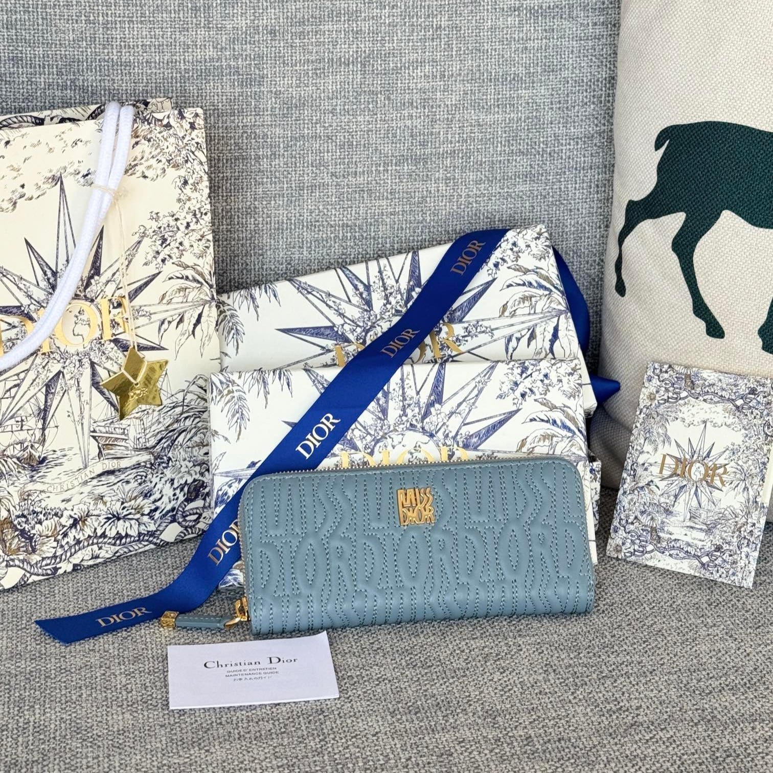 {Style No: QJC6ANYE} VERTICAL LONG ZIP WALLET 20 IN BABY BLUE QUILTED ALLOVER CALFSKIN