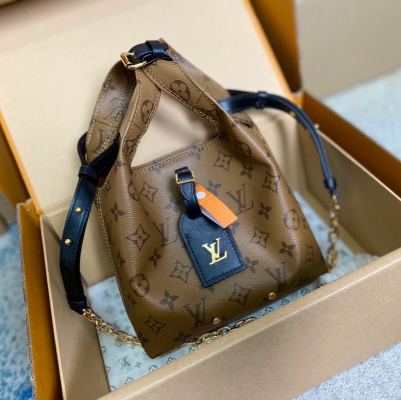 {Style No: FAAZPKW3} ATLANTIS BB 17 IN BROWN MONOGRAM REVERSE CANVAS
