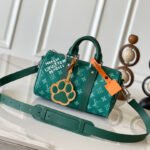 {Style No: YD6W4SJG} KEEPALL BANDOULIÈRE 25 IN GREEN MONOGRAM HERITAGE CANVAS
