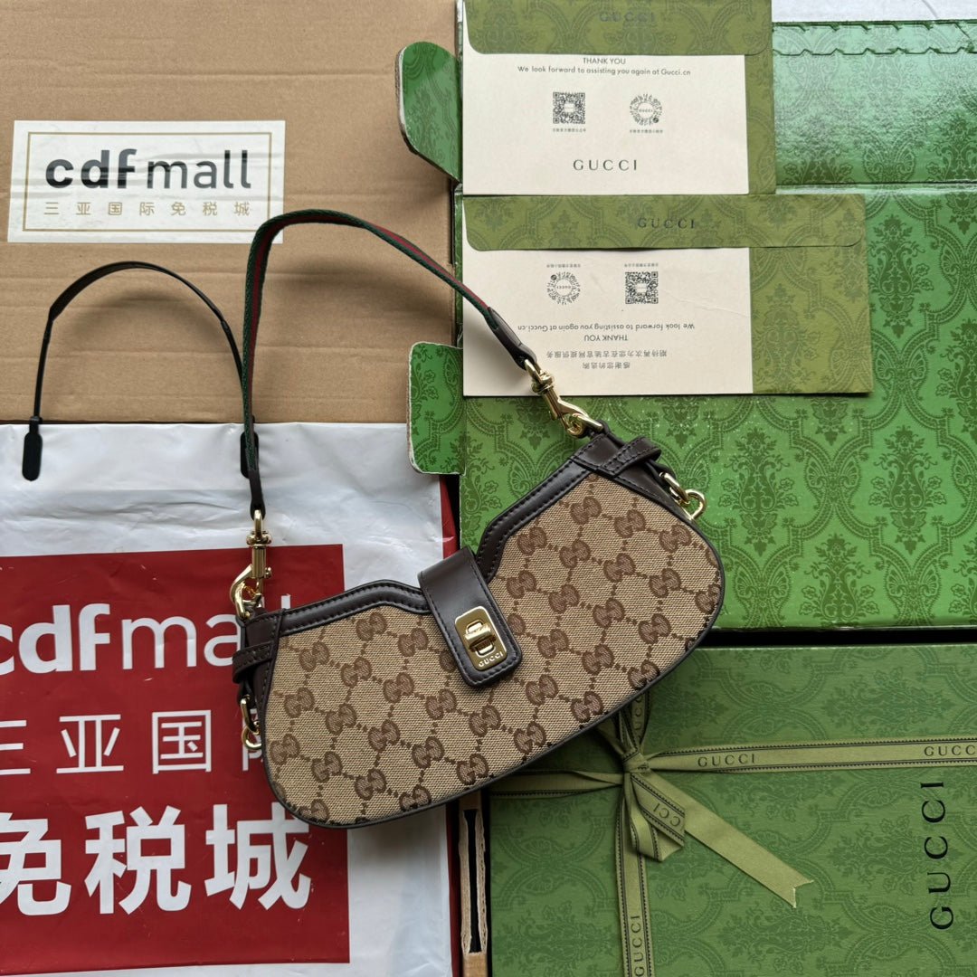 {Style No: E6TIK6HY} MOON SIDE SHOULDER BAG 24 IN BEIGE CANVAS AND DARK BROWN LEATHER TRIM