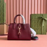 {Style No: FB7TF6XS} SMALL JACKIE TOTE 24 IN BURGUNDY LAMBSKIN