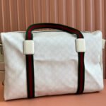 {Style No: DOZNTDQW} MEDIUM DUFFLE BAG WITH WEB 47 IN WHITE SOFT GG CALFSKIN