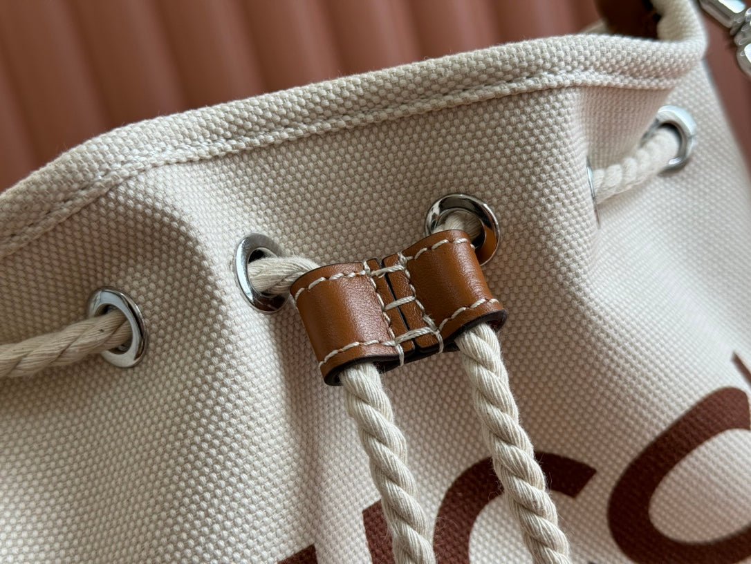 {Style No: EZTEJ3XD} SMALL DRAWSTRING SHOULDER BAG 21 IN WHITE CANVAS BROWN CALFSKIN - Image 8