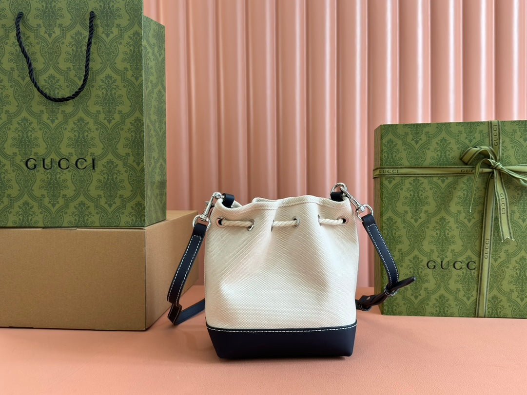{Style No: CJ8727RU} SMALL DRAWSTRING SHOULDER BAG 21 IN WHITE CANVAS DARK BLUE CALFSKIN - Image 4