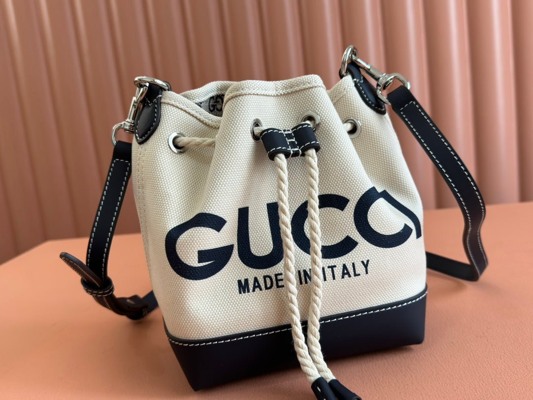 {Style No: CJ8727RU} SMALL DRAWSTRING SHOULDER BAG 21 IN WHITE CANVAS DARK BLUE CALFSKIN - Image 2