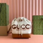 {Style No: YAWWYYRS} DRAWSTRING SHOULDER BAG LOGO PRINT 31 IN WHITE CANVAS BROWN CALFSKIN