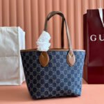 {Style No: TBHZQQ3H} SMALL TOTISSIMA REVERSIBLE TOTE 22 IN DARK BLUE DENIM ONE SIDE BLUE SUEDE