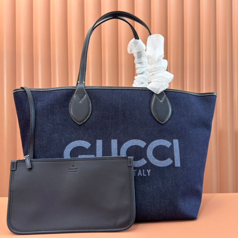 {Style No: N29C6Q1F} LARGE TOTISSIMA REVERSIBLE TOTE 30.5 IN DARK BLUE DENIM ONE SIDE BEIGE AND BLUE CALFSKIN ON THE OTHER