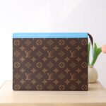 {Style No: UZJ1HW5C} LV 25S POCHETTE VOYAGE 26 IN GASTON BLUE MONOGRAM MACASSAR COATED CANVAS