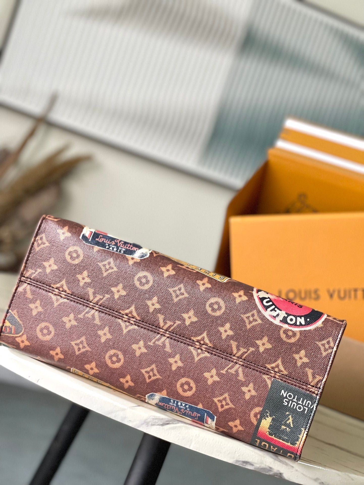 {Style No: EMWVU7UR} ONTHEGO VOYAGE 35 IN BROWN MONOGRAM CANVAS WITH VINTAGE HOTEL LABELS - Image 5
