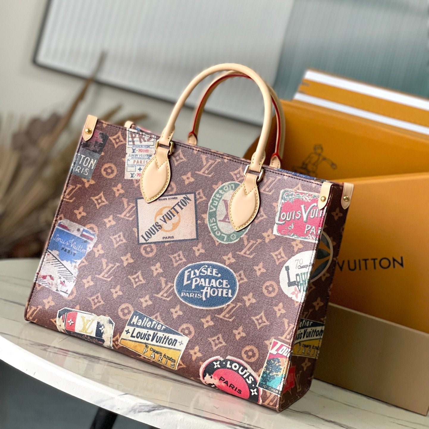 {Style No: EMWVU7UR} ONTHEGO VOYAGE 35 IN BROWN MONOGRAM CANVAS WITH VINTAGE HOTEL LABELS
