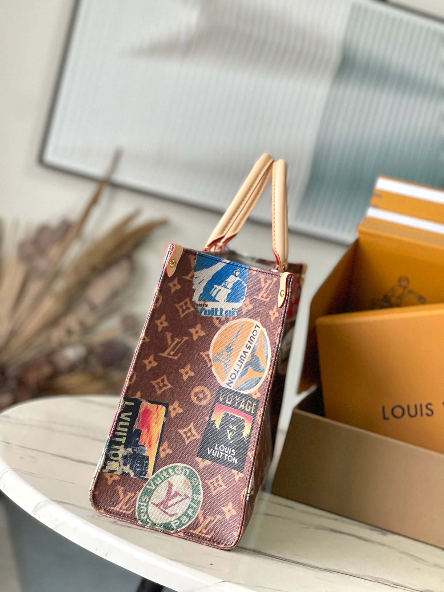 {Style No: EMWVU7UR} ONTHEGO VOYAGE 35 IN BROWN MONOGRAM CANVAS WITH VINTAGE HOTEL LABELS - Image 6