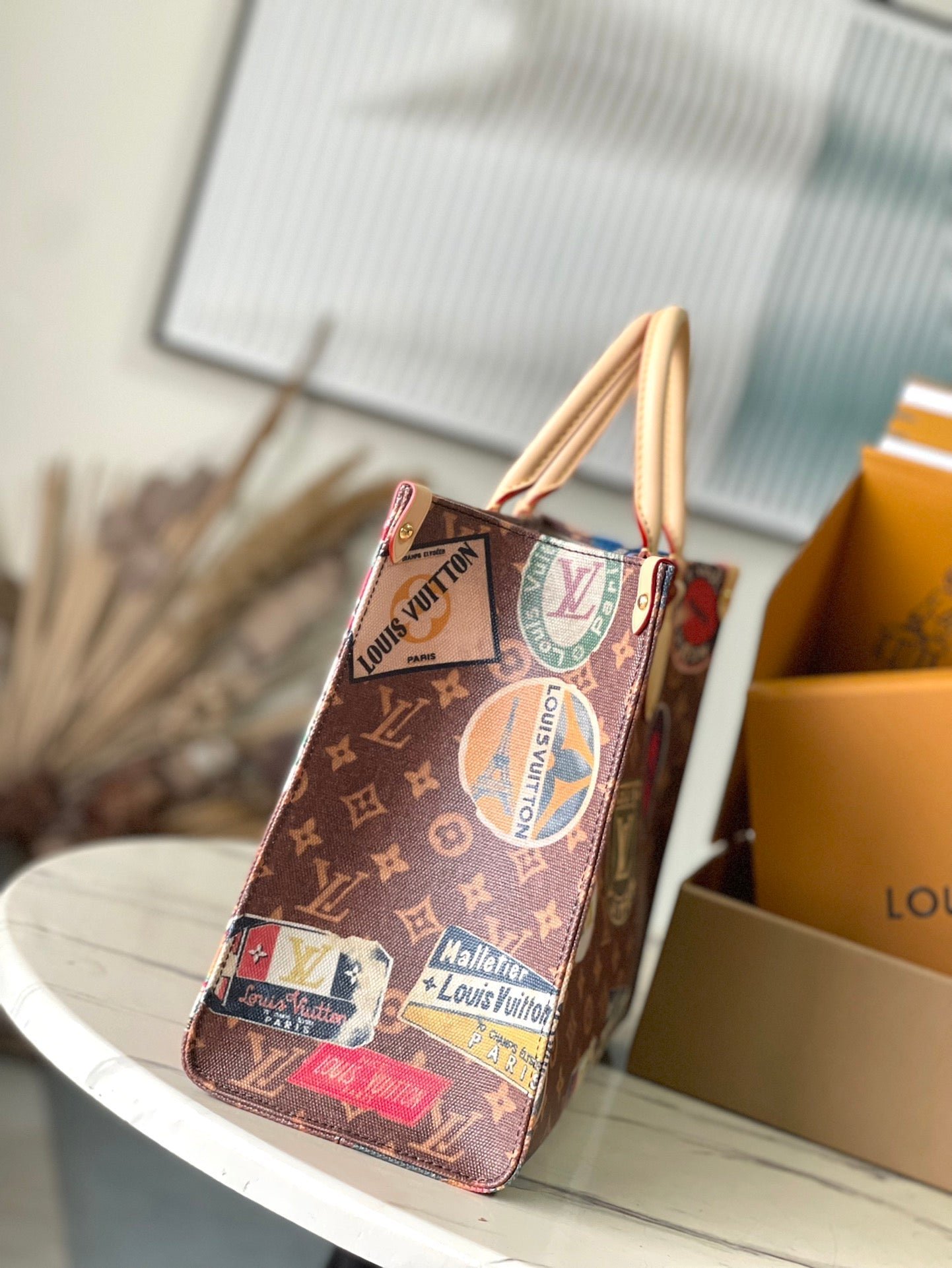 {Style No: EMWVU7UR} ONTHEGO VOYAGE 35 IN BROWN MONOGRAM CANVAS WITH VINTAGE HOTEL LABELS - Image 9
