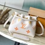 {Style No: ISMEZBPY} BUNDLE 28 IN WHITE ORANGE MONOGRAM EMPREINTE LEATHER GOLD HARDWARE