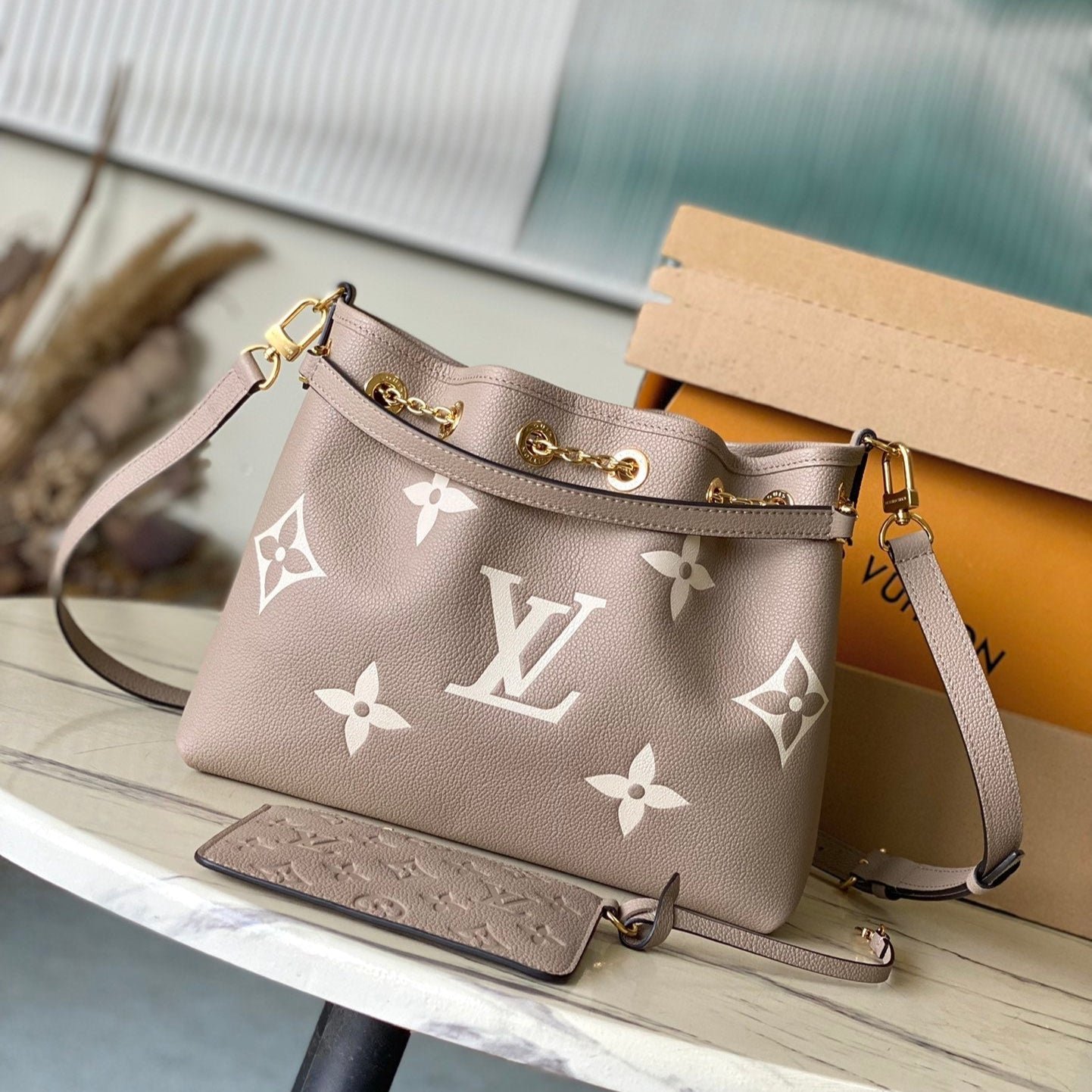 {Style No: IINQNX6U} BUNDLE 28 IN TOURTERELLE WHITE MONOGRAM EMPREINTE LEATHER GOLD HARDWARE
