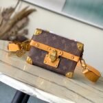 {Style No: 85U4ZUMX} SOUL TRUNK 19 IN BROWN MONOGRAM DUST CANVAS GOLD HARDWARE