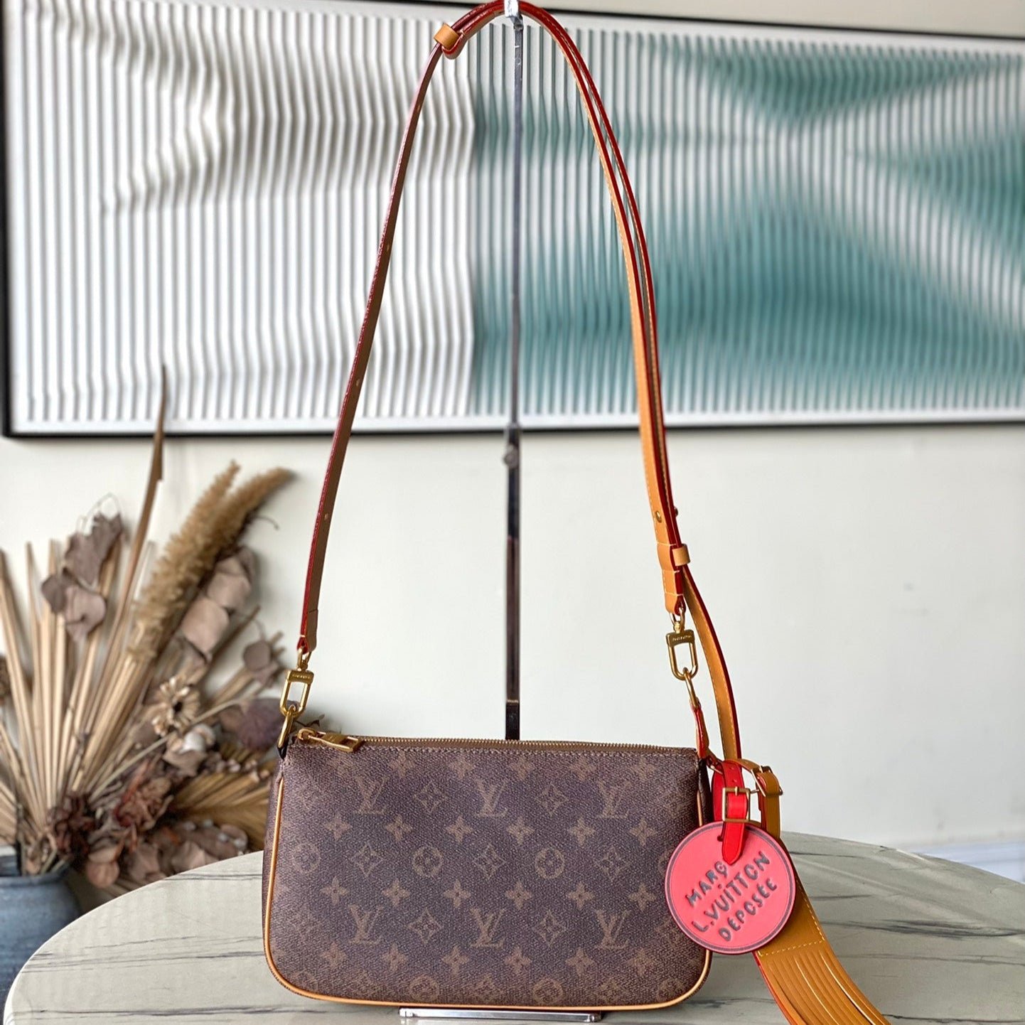 {Style No: OMD3LPOF} POCHETTE ACCESSOIRE XL 28 IN BROWN MONOGRAM DUST CANVAS