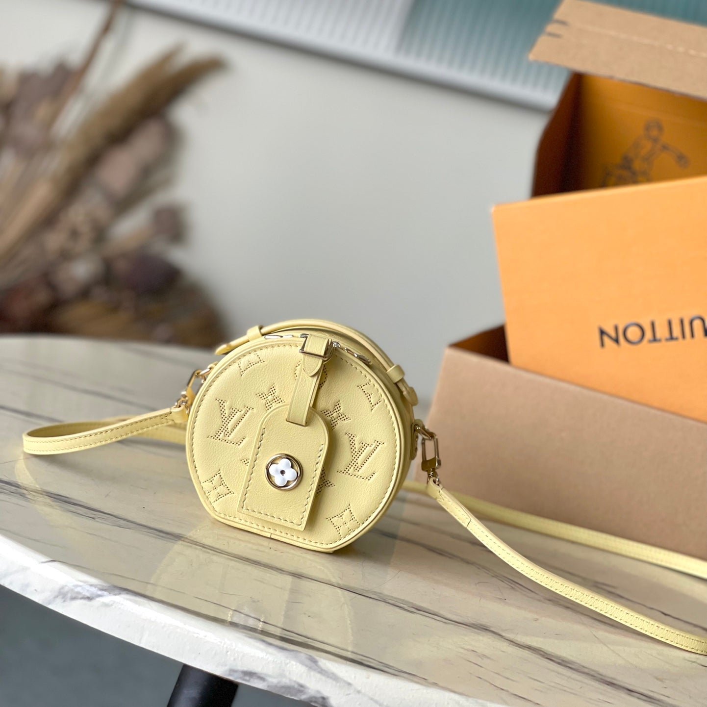 {Style No: 9KZB3O3U} MINI BOITE CHAPEAU 13 IN BANANA YELLOW MONOGRAM PERFORATED CALFSKIN
